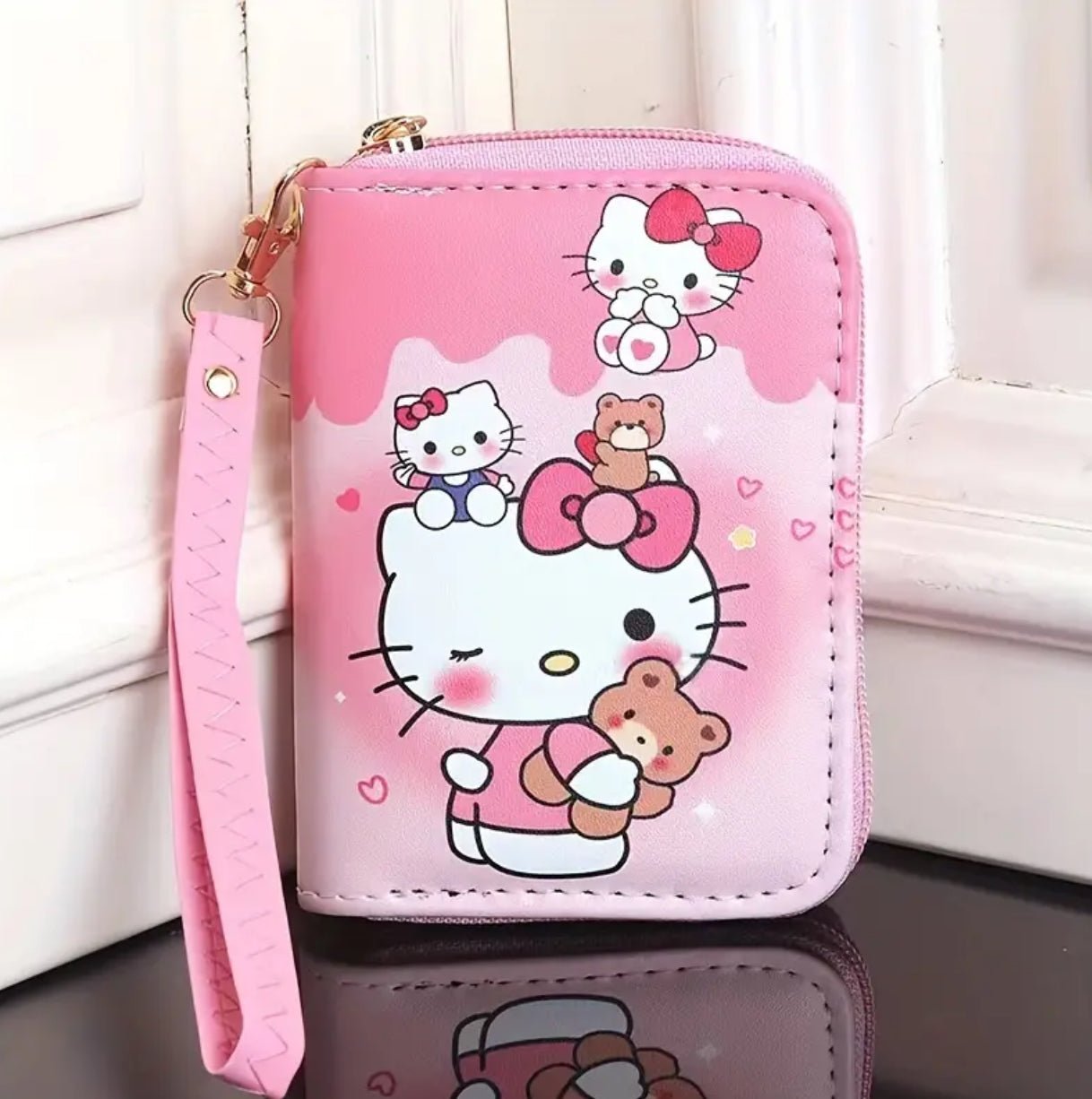 Sanrio Compact Wallet. محفظة سانريو المدمجة - Princess Cosmetics Qatar