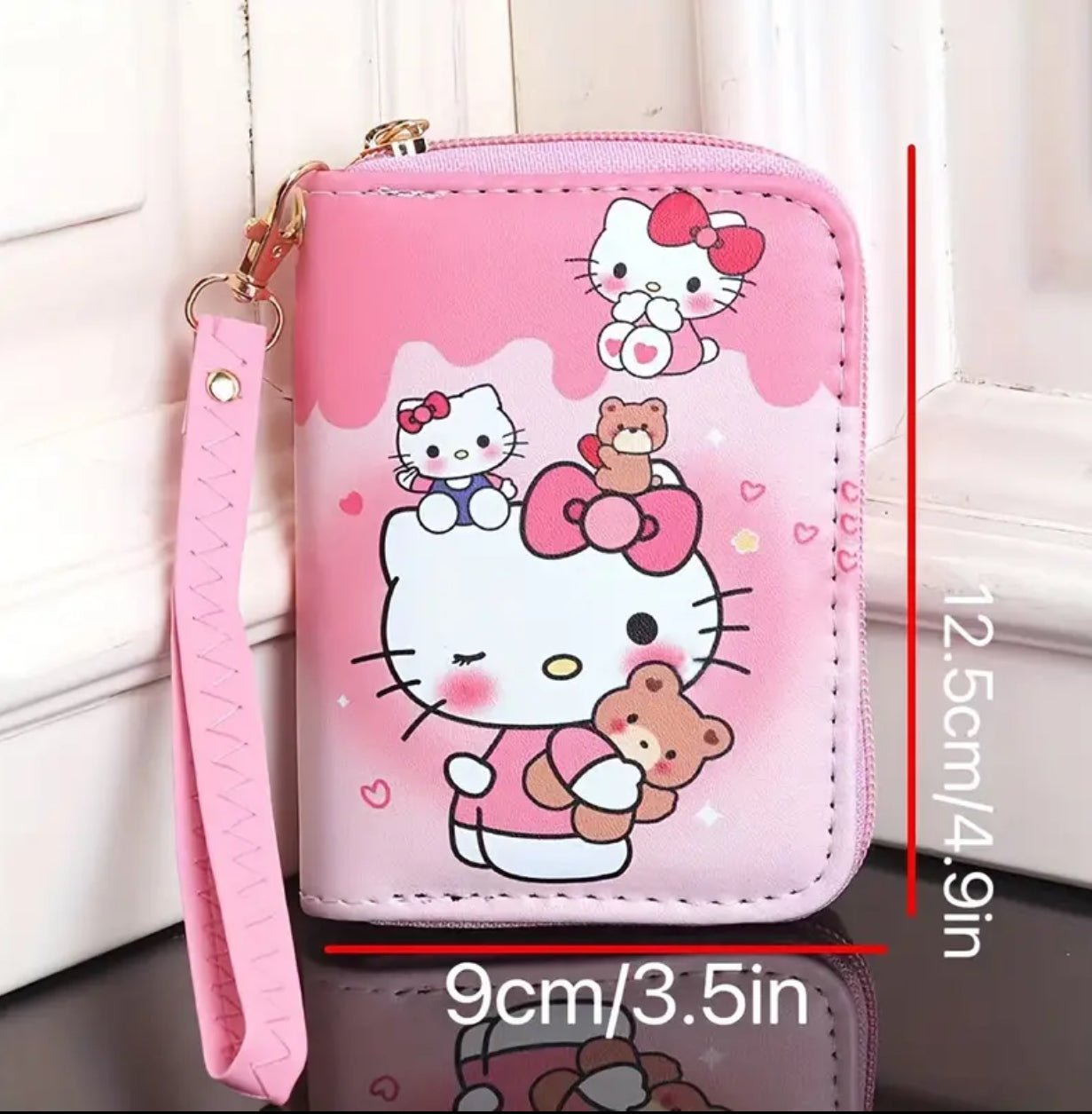 Sanrio Compact Wallet. محفظة سانريو المدمجة - Princess Cosmetics Qatar