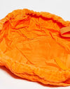 The Flat Lay Co. Drawstring Bag - Orange Towel. ذا فلات لاي كو. حقيبة برباط - منشفة برتقالية - Princess Cosmetics Qatar